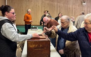 East Machias Residents Vote to Make Early County TAN Payment, but with Conditions