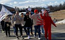 Machias Cheerleaders welcome the players